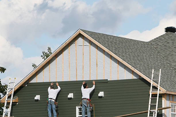 Professional Siding technician working in Calhan, CO
